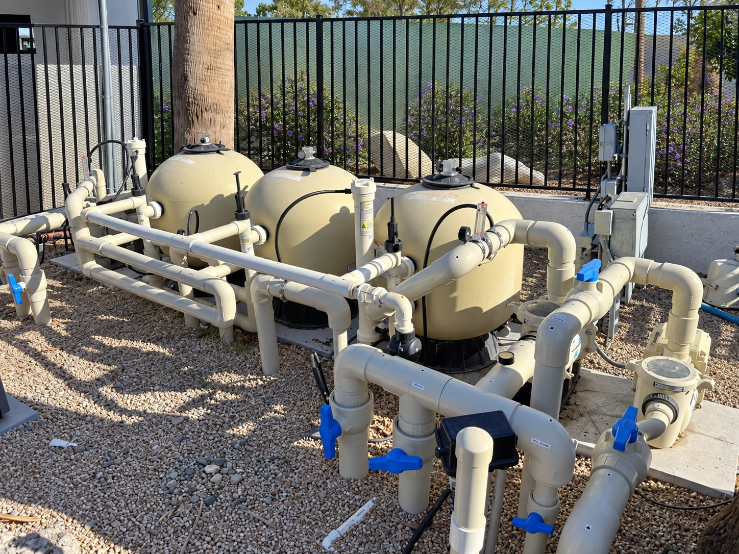 Three-filter installation with pool pumps, plumbing and valves