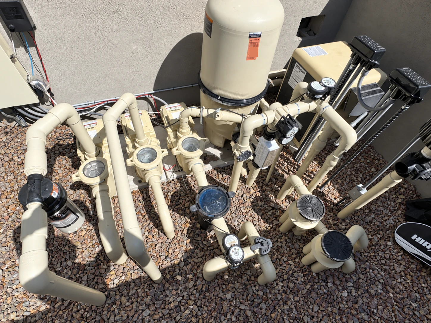 Residential pool equipment with pumps, filter and plumbing