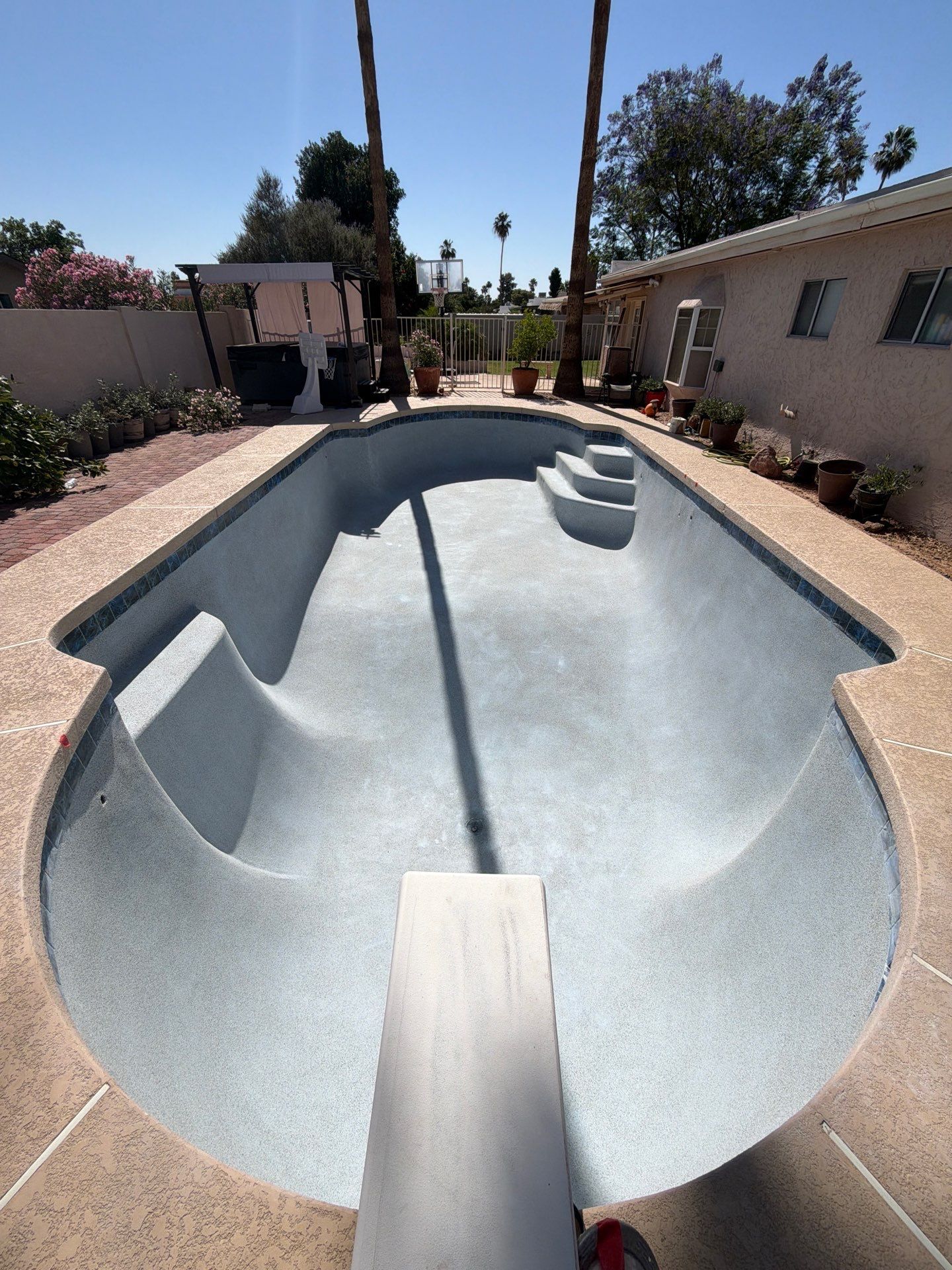 The newly surfaced pool, still empty.