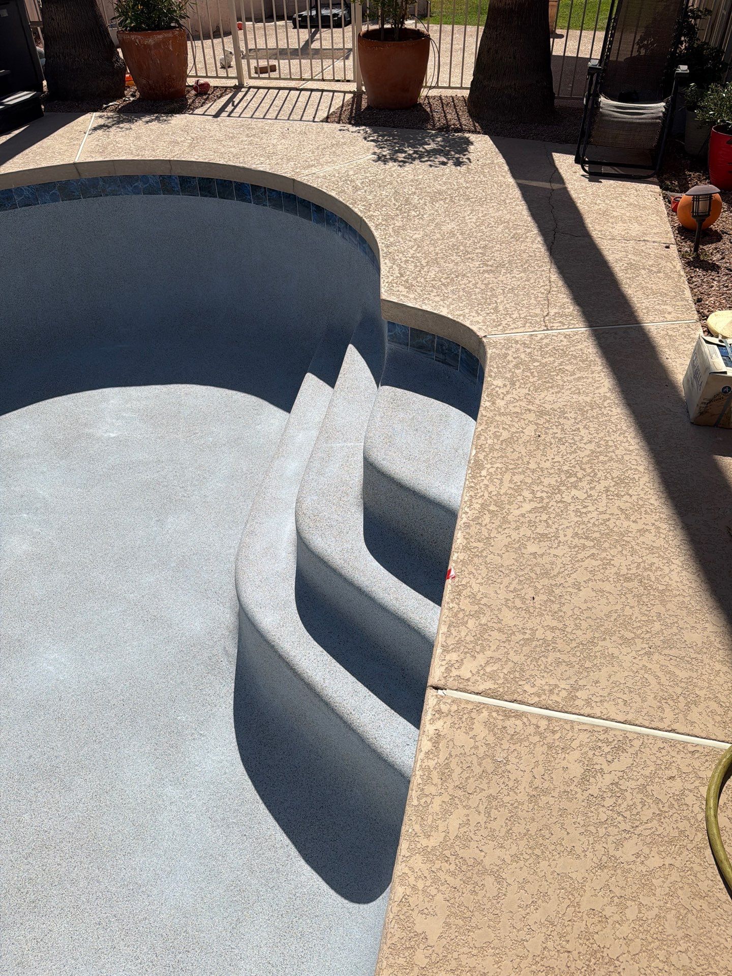 The steps and adjacent finish before refilling.